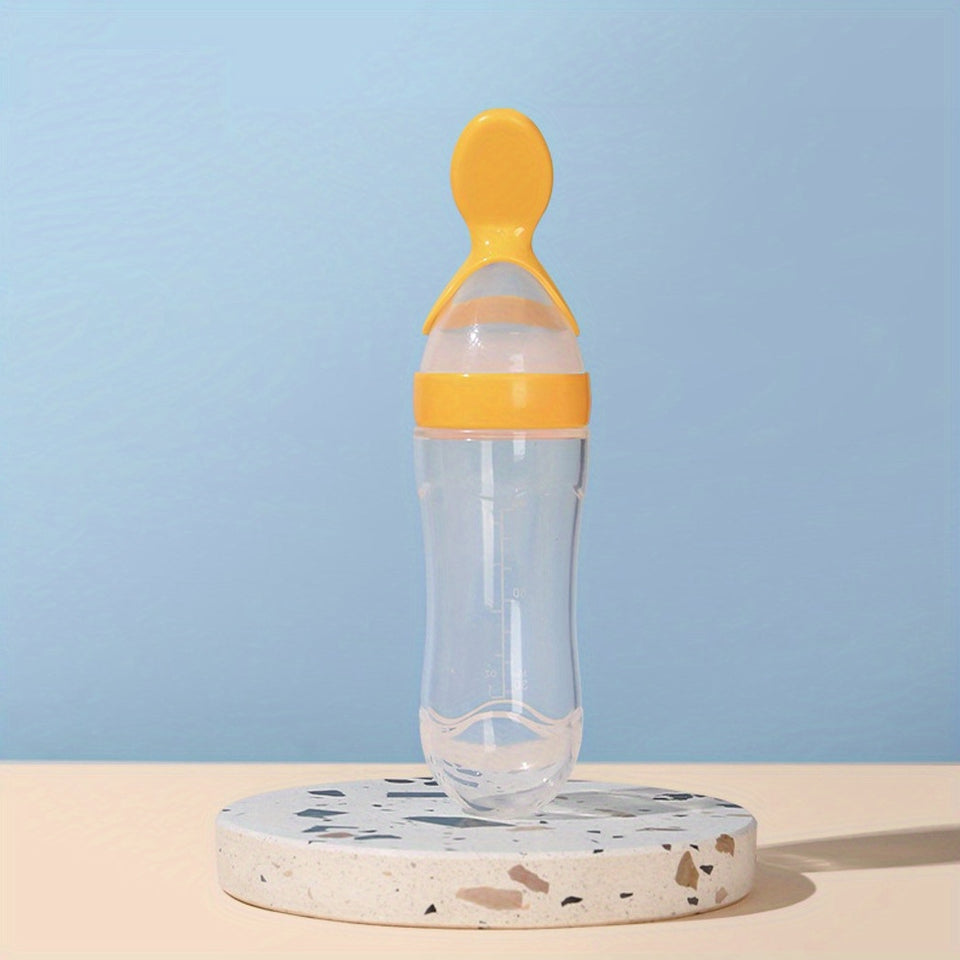 Biberón y cuchara de silicona para alimentar a los bebés