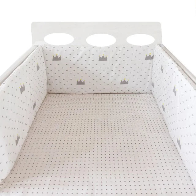 Protector de cuna con laterales