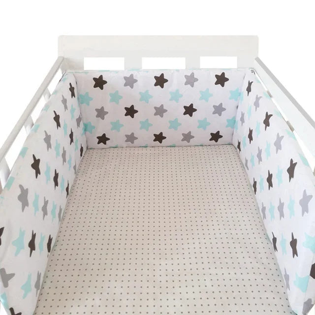 Protector de cuna con laterales