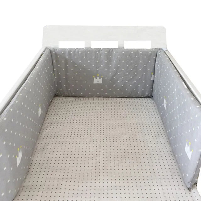 Protector de cuna con laterales