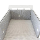 Protector de cuna con laterales