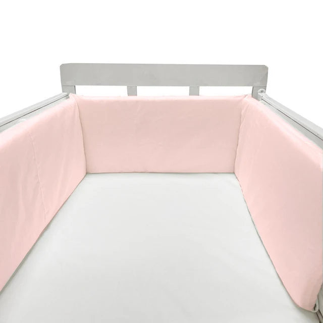 Protector de cuna con laterales